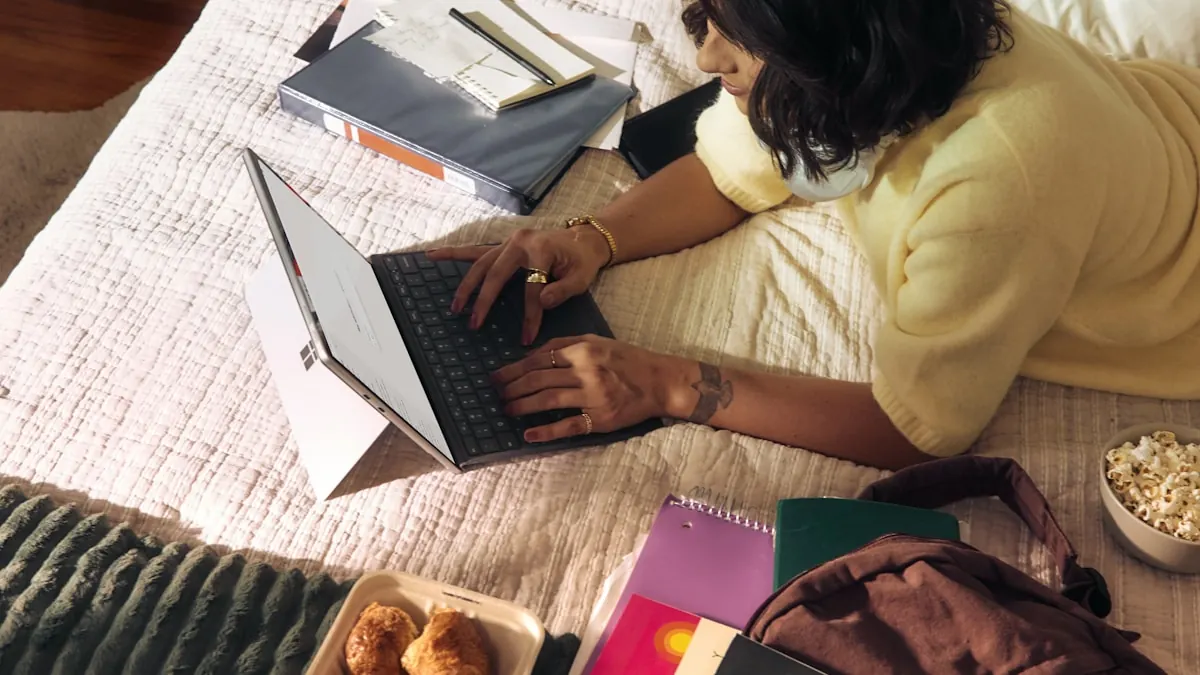 Vorapix use case — a weekend creator lying on a bed with a laptop, notebooks and a bowl of popcorn