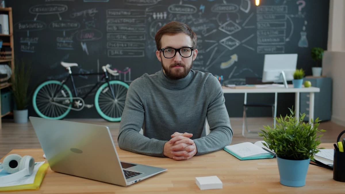 A founder working alone at an office desk