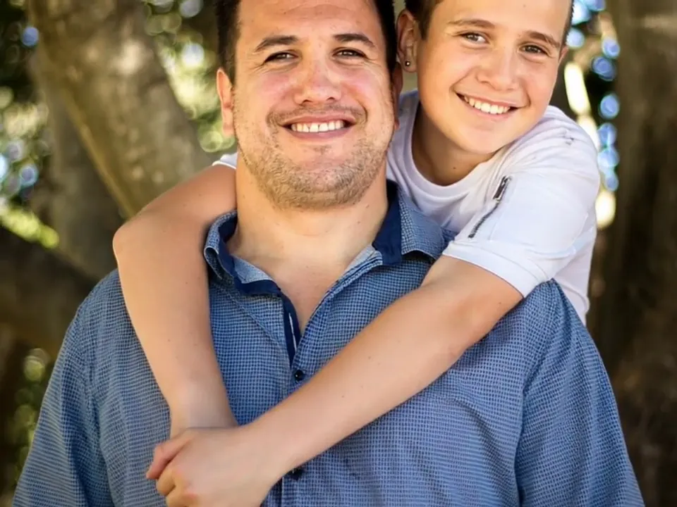 A father-and-son snapshot put into gentle motion from one still